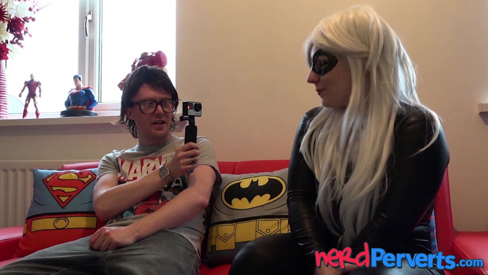 Natural blonde Haley Quinn sucking latex suit