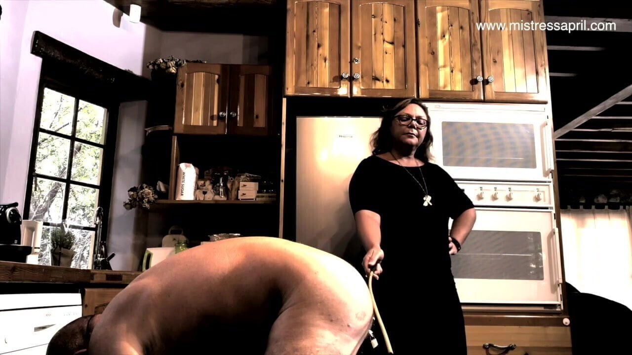 Dominatrix Mistress April caning slave’s