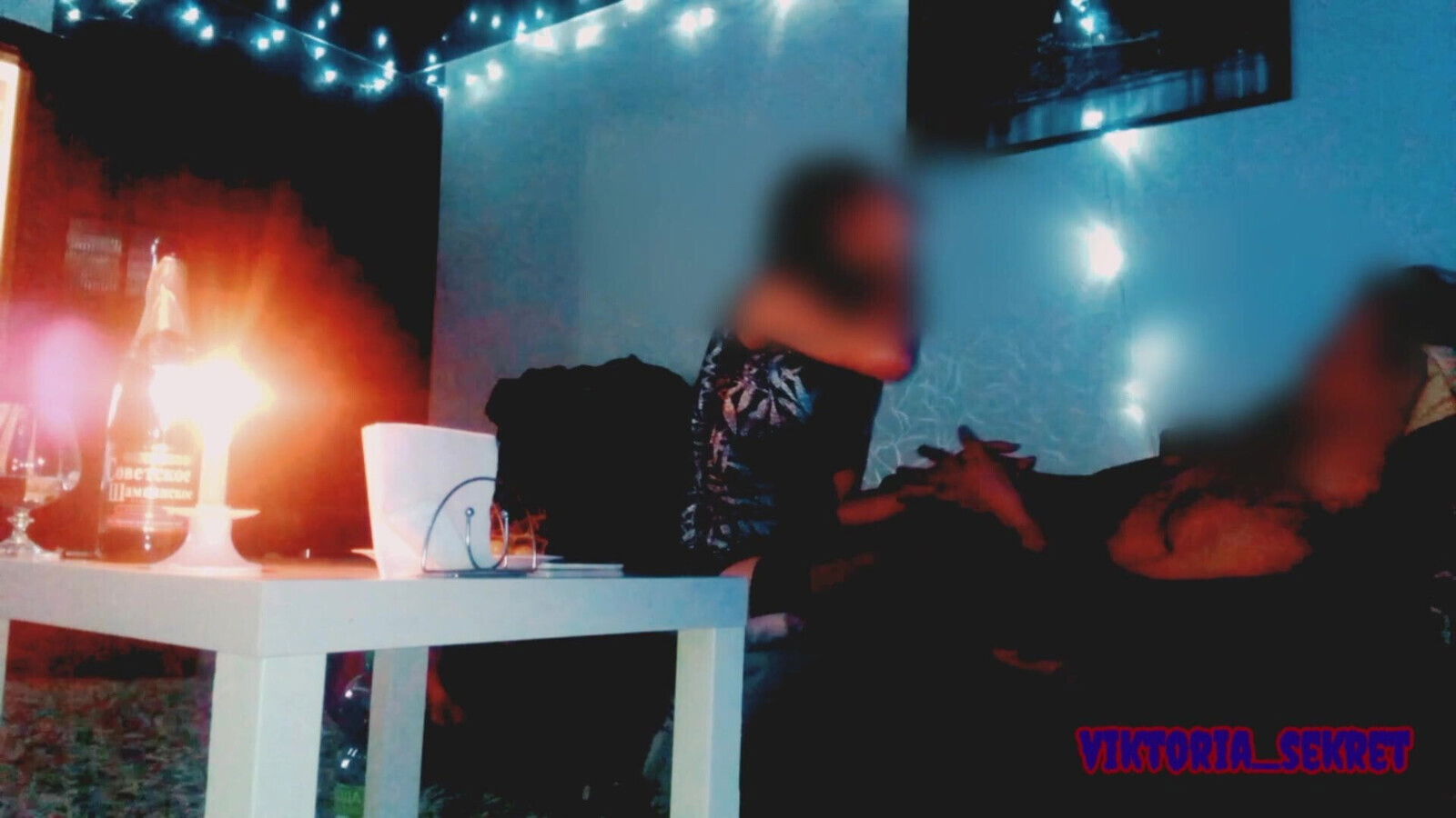 wife with friend writes down gift husband