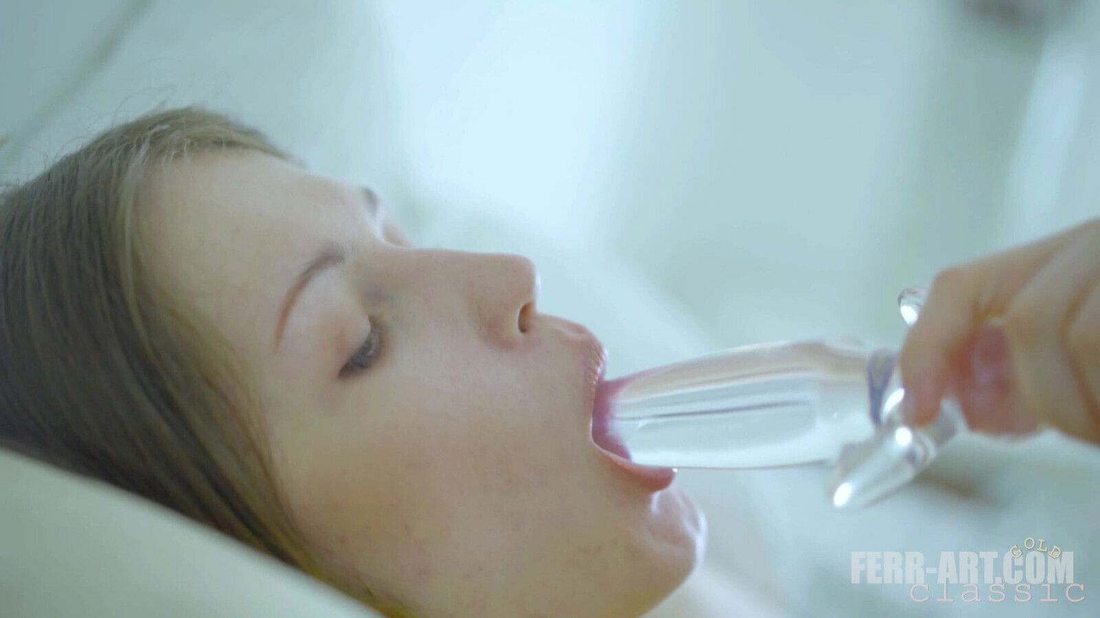 Sensual lesbian kissing, pussy licking dildo play.