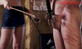 Cruel lady deals out serious ballbusting