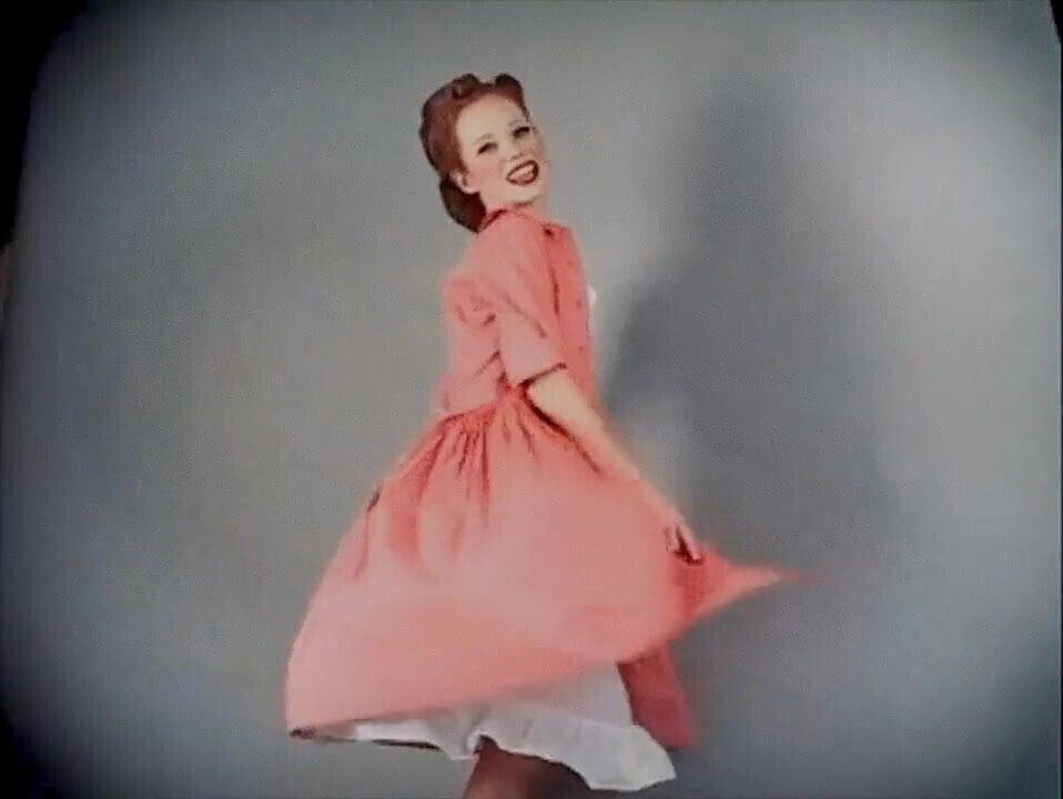 Vintage style, redhead stockings does striptease