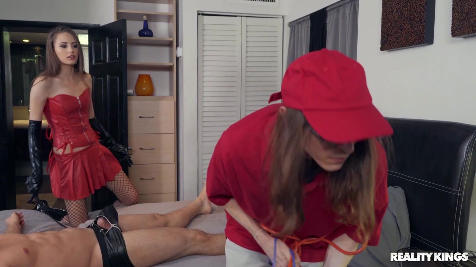 Young dominatrix with huge sexual appetite pleasuring slaveboy