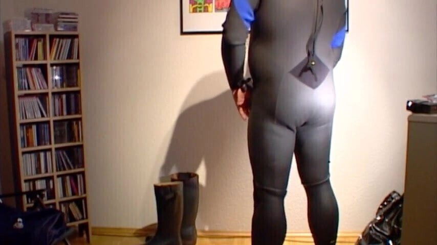 fetish gear with cumshot.