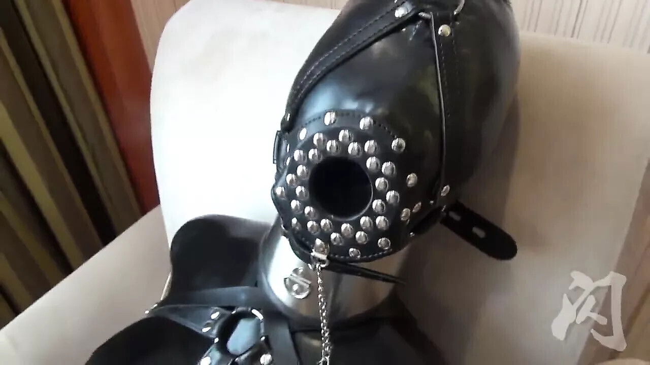 Latex bondage gasmask play