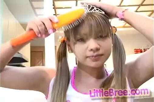Little Bree brushers hair then shows tiny pussy