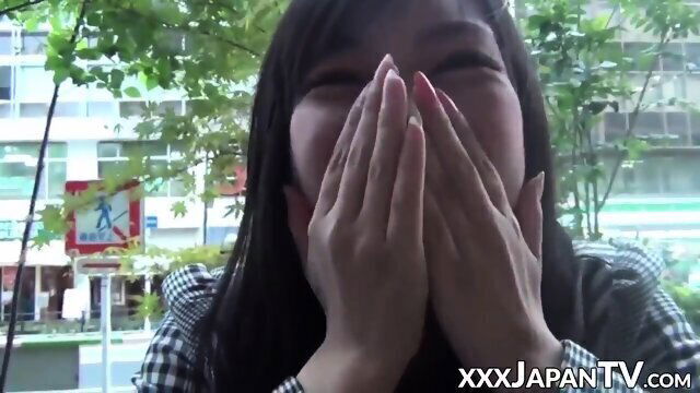 Youthful Japanese cutie showing pussy