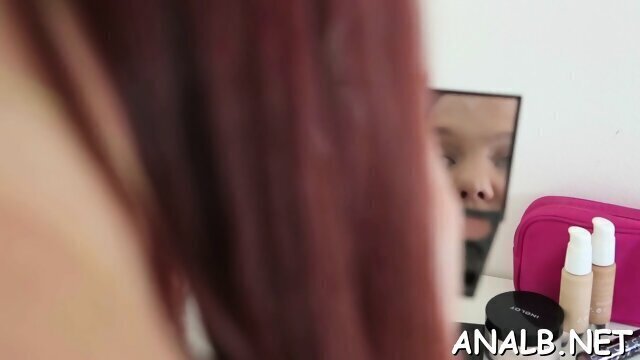 Lovable redhead Sabina bends down