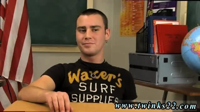 Young small Young dark haired Justin Giles desk classroom