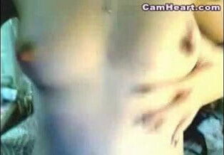 Plays with a dildo then uses her finger to masturbate