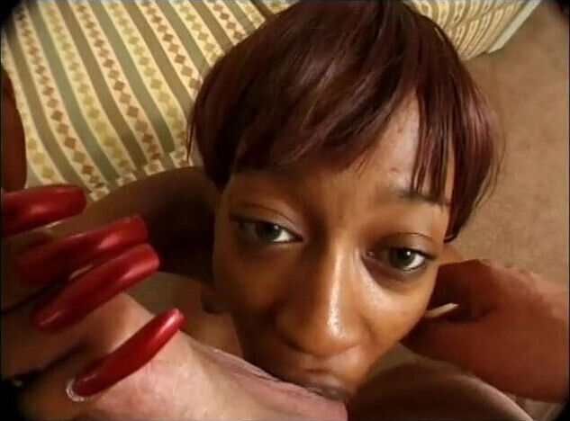 Black long nailed girl sucks juice