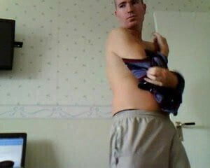 Male stripping in bedroom