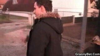 Blonde grandma in black stockings rides young cock 