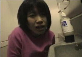 Asian Girl Masturbates in Airplane Bathroom