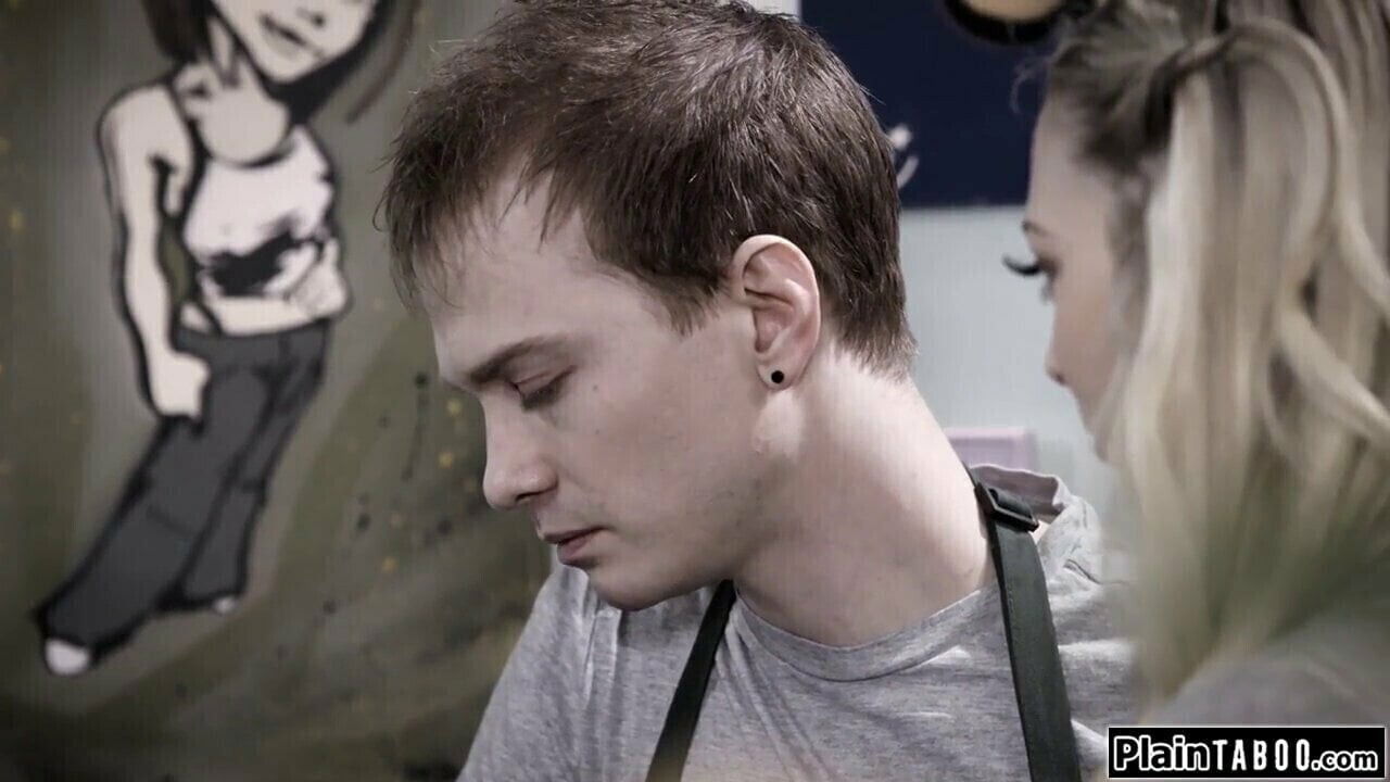 Petite blonde help customer while rimmed behind counter