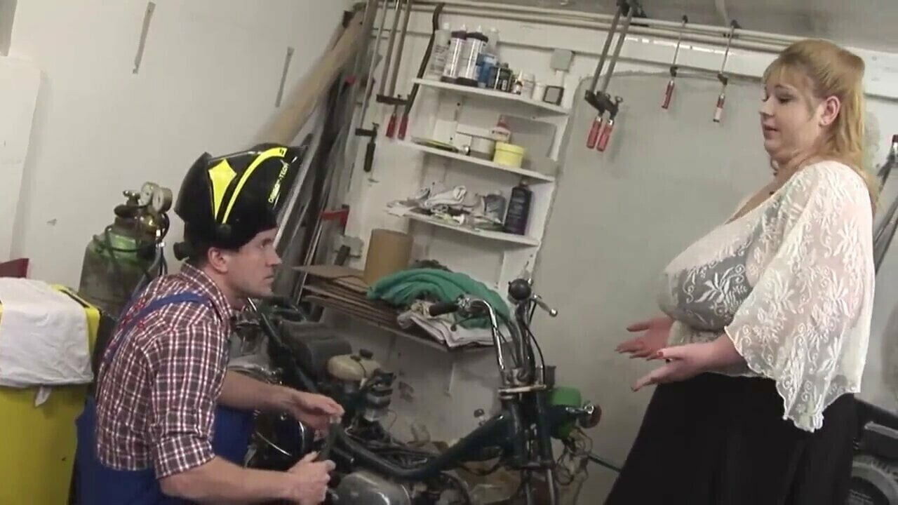 Busty milf meets mechanic