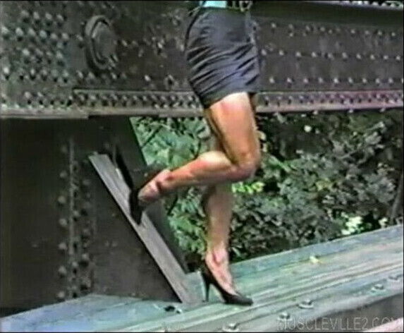 Joanne McCartney black mini skirt, railroad