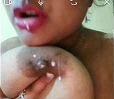 Desi Indian aunty taking out milk in video call