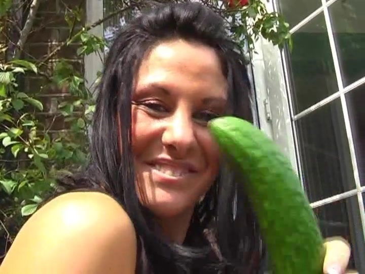 Naughty Crystel drills pussy with cucumber