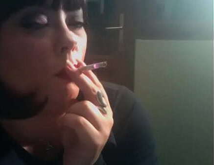 Tina Snua Chain Smokes Cigarettes