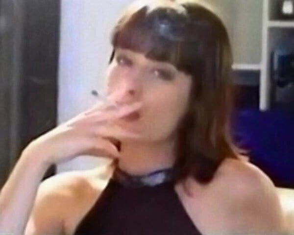 Woman Relaxes with Smoke