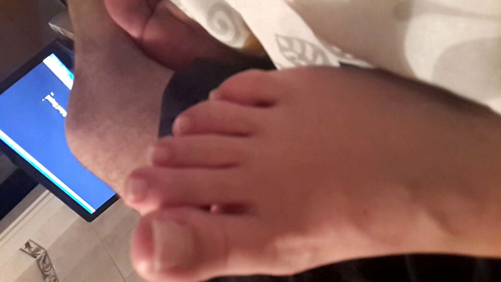 pedicured long feet toes