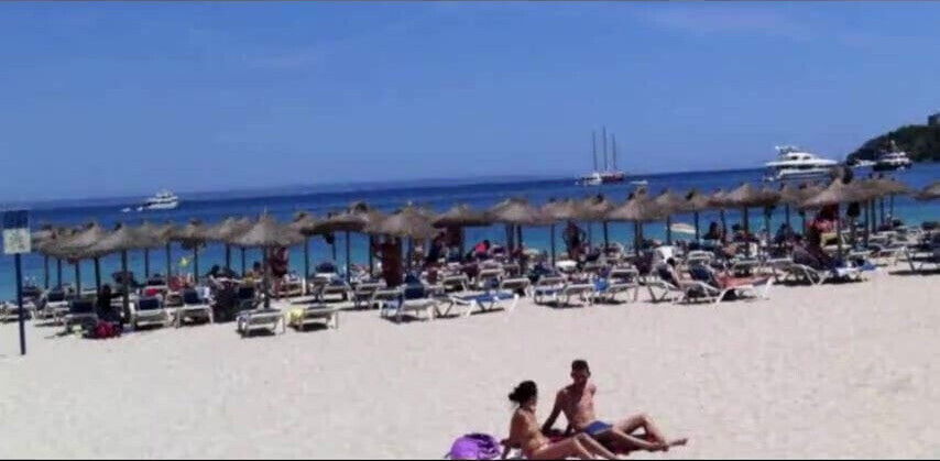Beach sun bathing couple
