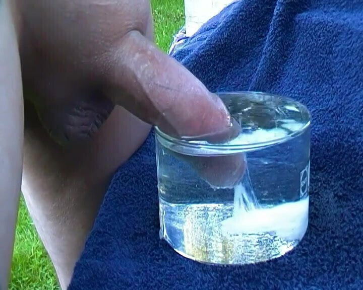 Drooling uncut penis ejaculates under water - big cum shot