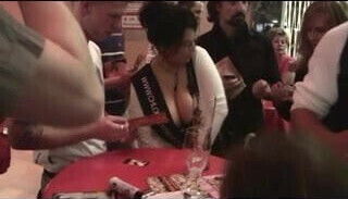 CV signing autographs.