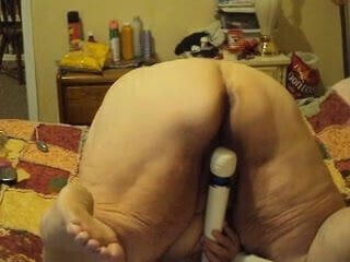 playing with wand doggy stile 