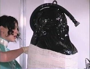 Sexy brunette covered rubber