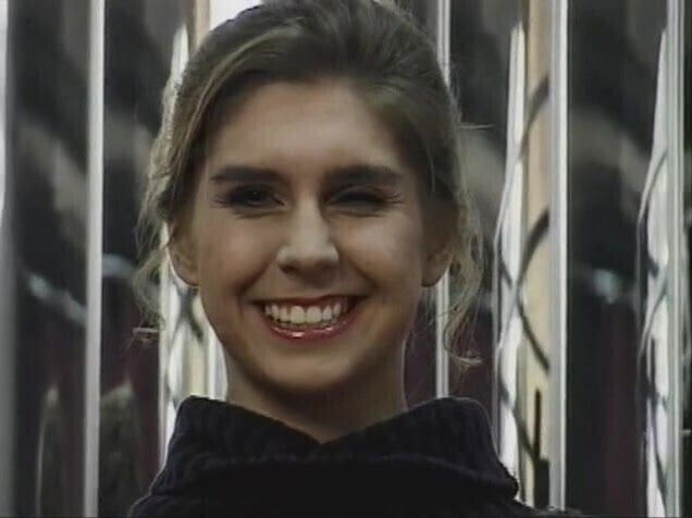 Well toned brunette with pierced clit strips and splits