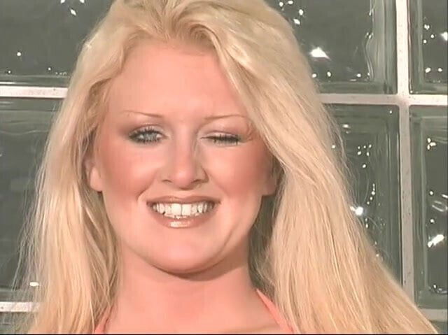 Hot blonde removes pink dress and panties solo