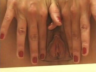 Office babe wearing glasses strips naked 