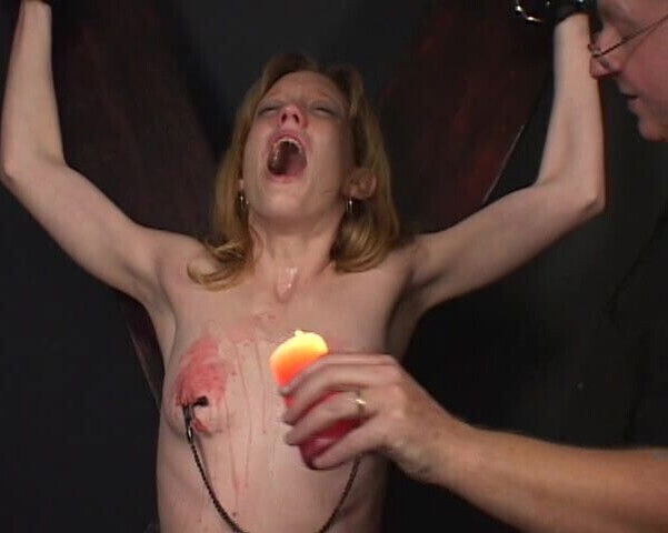 Small tits chick ends up with hot wax on her tits at the hands of her master