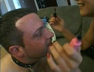 Femdom Asian gets her strapon sucked by man slave 