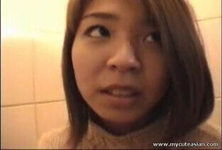 Cute Asian foddling with pussy