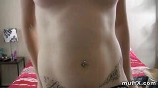 Busty Breanna plays with violet dildo