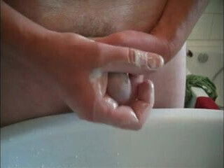 Close creaming jerking fresh shaved