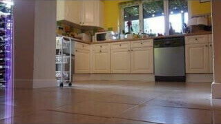 Maid scrub kitchen floor