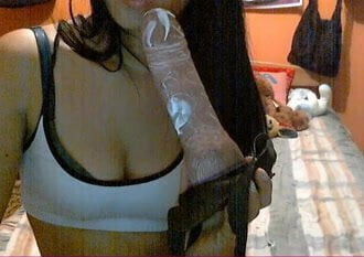 Sexy Girl Sucks Milky Dildo