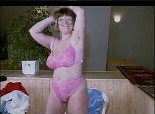 chubby amateur woman with glass and big tits stripping