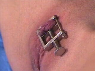 Slave gets bound with pussy lips wide open