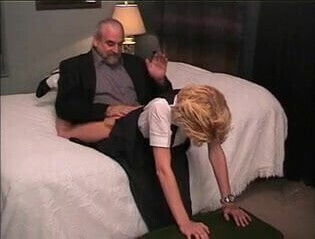 Innocent cute blonde's bare ass gets spanked red with a yardstick