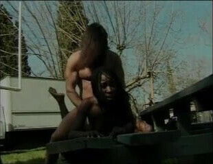 Black girl sucks cock and gets cunt fucked and licked on the lawn bench