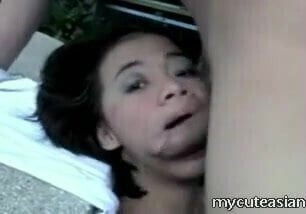Cute Asian chick sucking some