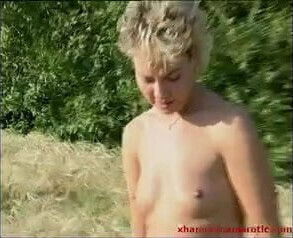 Blonde german MILF strips in cornfield
