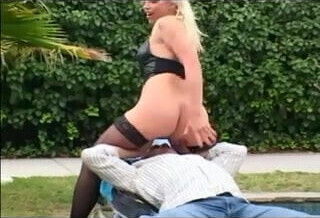 Sexy blonde Nikki facesitting in fishnet lingerie