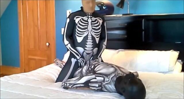 Spandex skeleton with stocking mask gassing black masked android