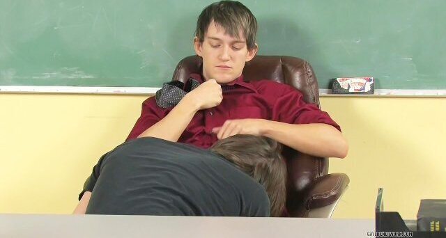 Spencer give professor head under desk